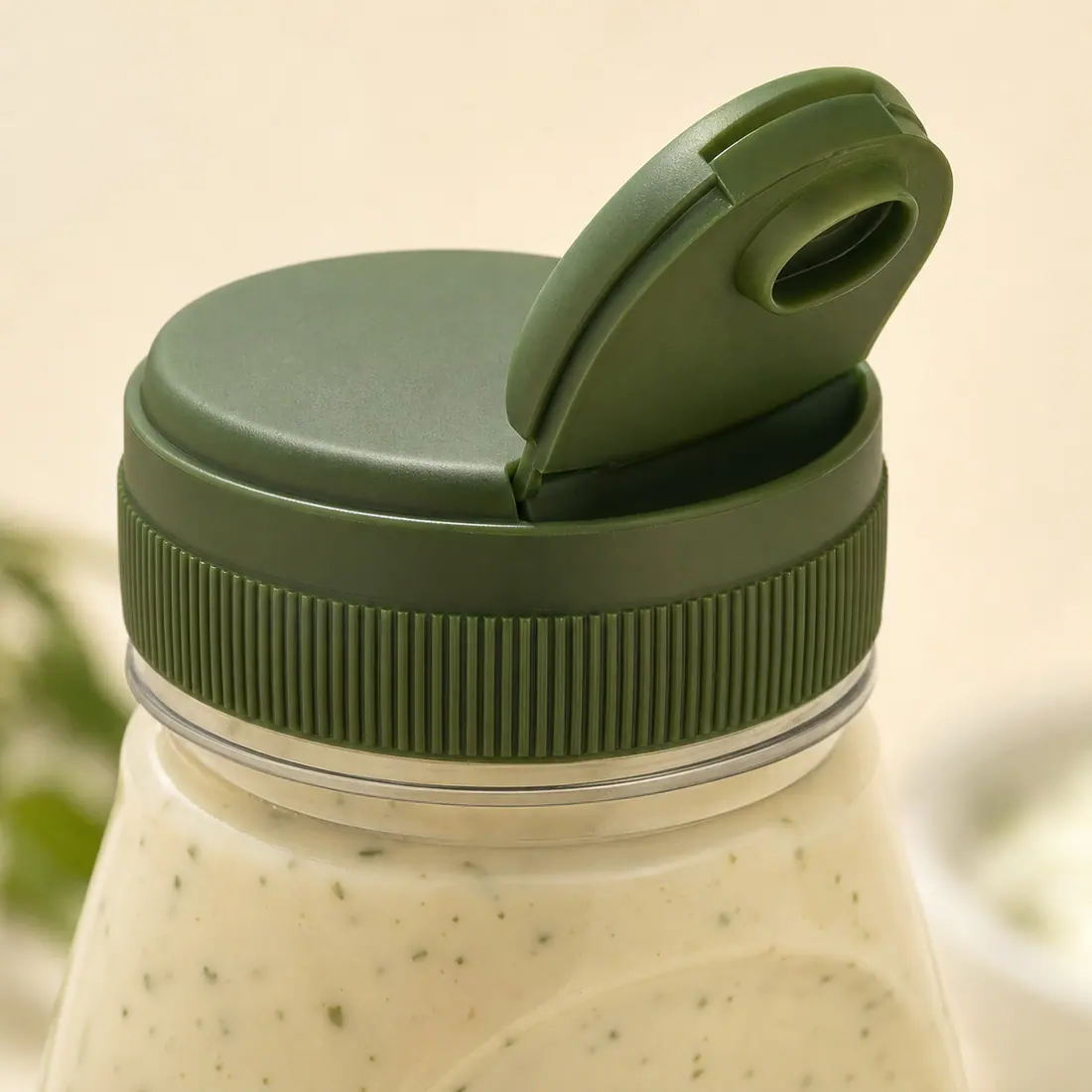 Bouteilles pour vinaigrette avec bouchon Disc-Top détail du bouchon et de l'étanchéité