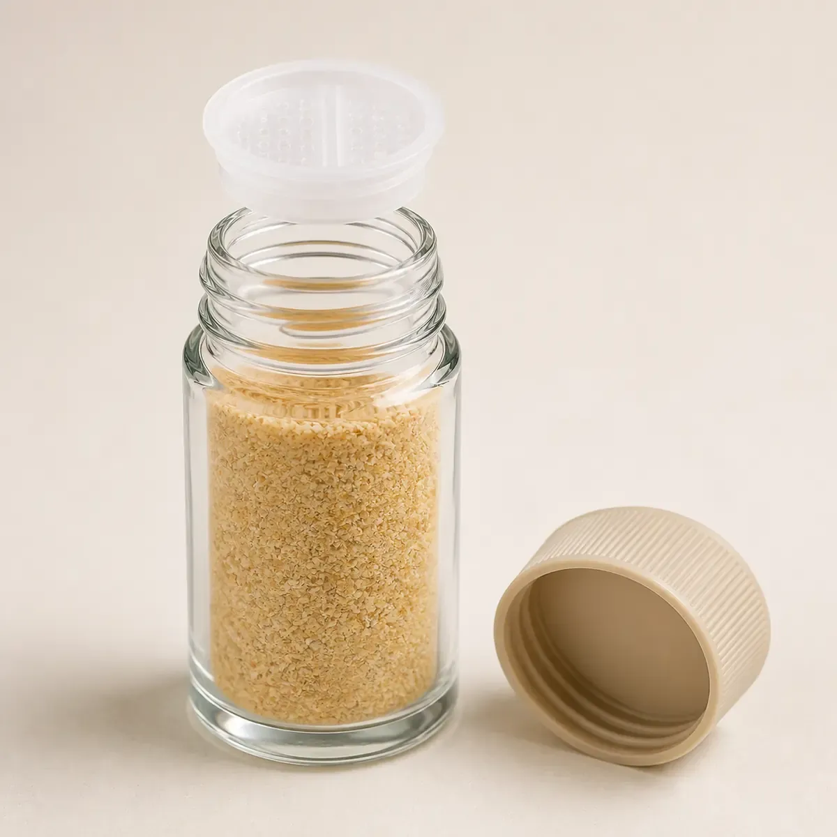 Saupoudreuse en verre pour épices fines détail du bouchon et de l'étanchéité