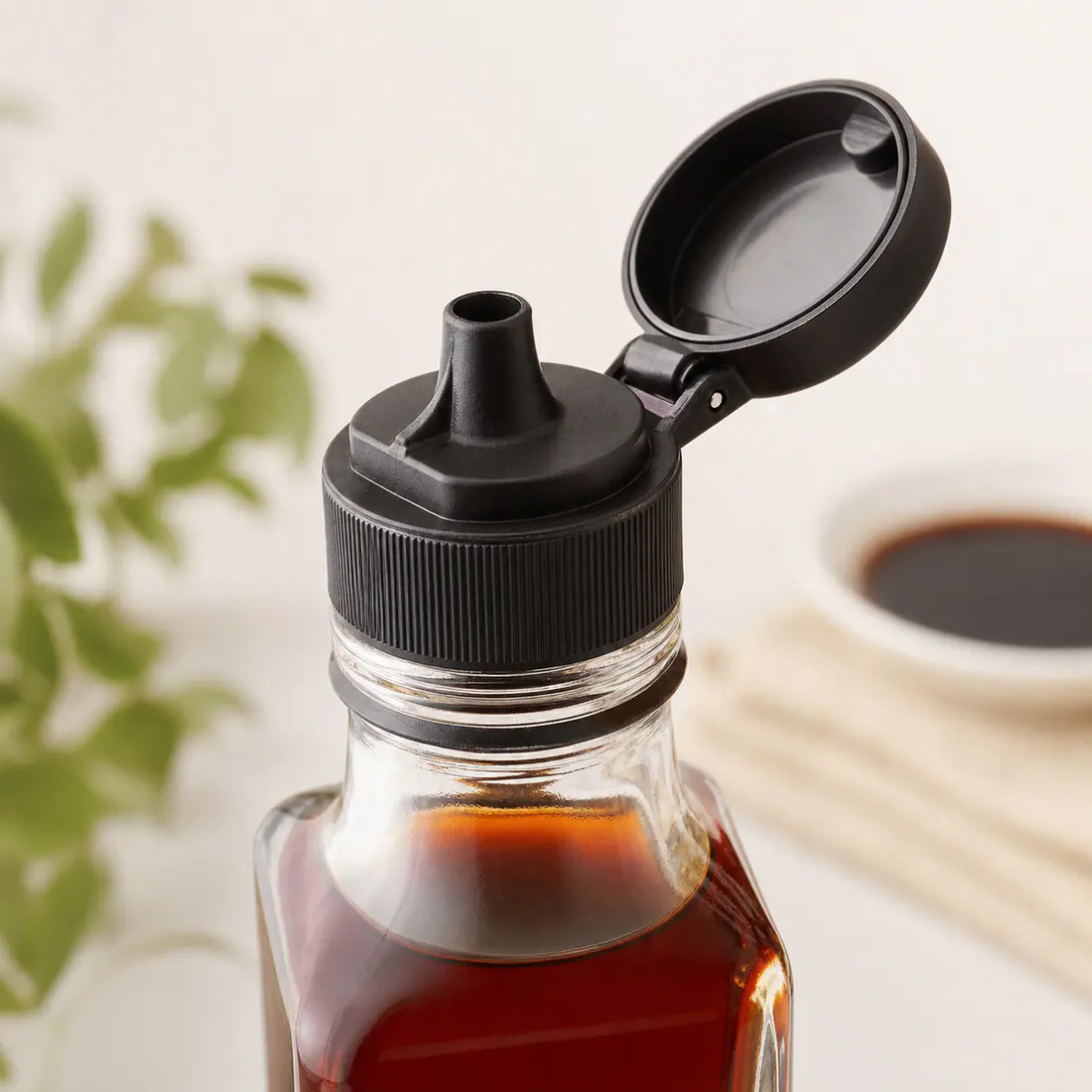 Bouteilles verseuses en verre pour sauce soja détail du bouchon et de l'étanchéité