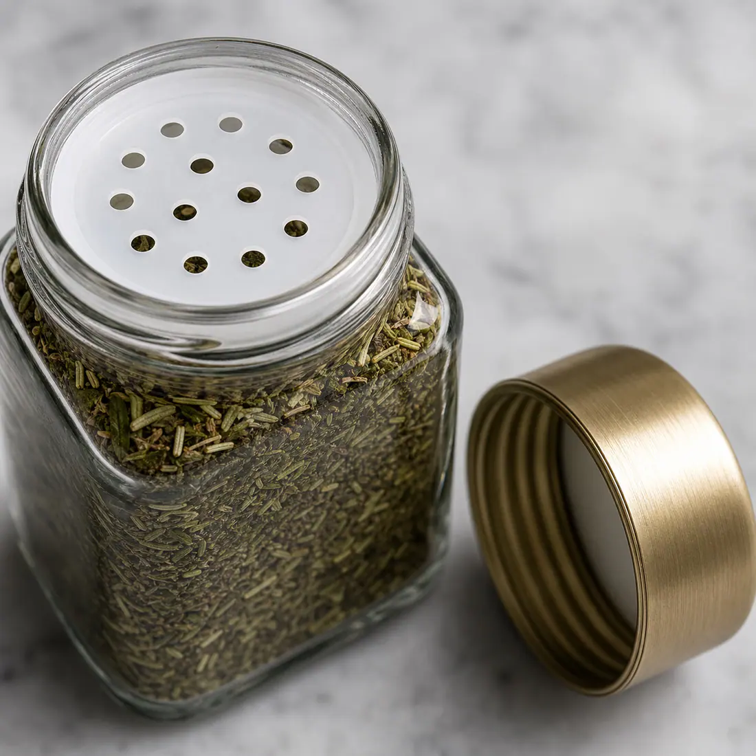 Pots à épices en verre avec couvercle métallique détail du bouchon et de l'étanchéité