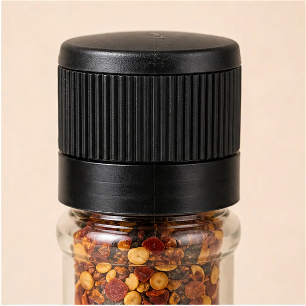 Mini-moulin à épices, tête noire, 80 ml détail du bouchon et de l'étanchéité