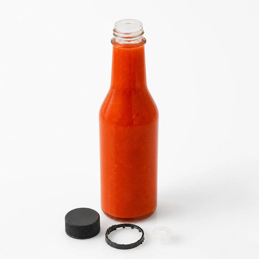 Bouteilles pour sauce piquante avec témoin d'ouverture détail du matériau et de la fabrication